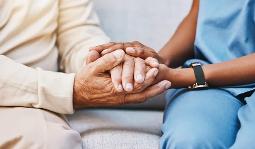 Hands held in support